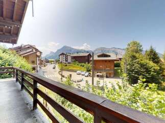 Enjoy breathtaking mountain views from this charming balcony, perfect for your morning coffee or evening relaxation.