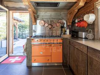Experience rustic charm and modern convenience in this stunning mountain kitchen.