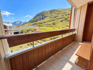 Enjoy breathtaking mountain views from this charming balcony, perfect for your morning coffee or evening relaxation.