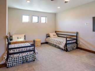 This charming bedroom features two twin beds, perfect for accommodating guests or children.