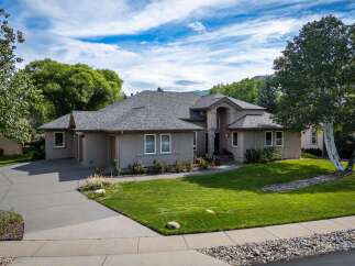 Discover this stunning single-family home featuring a spacious layout and elegant stucco exterior.