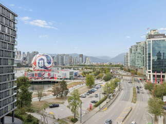 Experience breathtaking city and mountain views from this stunning property, featuring modern architecture and a prime waterfront location.