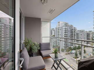 Enjoy breathtaking city views from this stunning balcony, perfect for relaxing or entertaining.