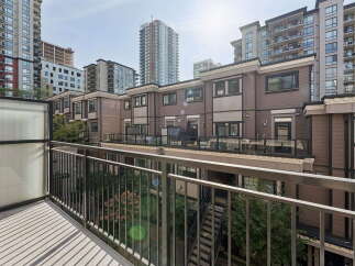 Experience modern urban living in this stunning townhouse complex, featuring contemporary architecture and spacious balconies perfect for enjoying city views.