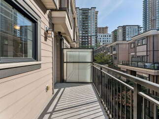 Enjoy the outdoors from this charming balcony, perfect for morning coffee or evening relaxation.