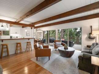 Experience the perfect blend of modern comfort and rustic charm in this inviting living space.