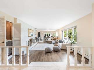 Step into this beautifully renovated open-concept living space, perfect for entertaining.