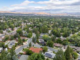 Discover this charming suburban neighborhood with mature trees and well-maintained homes.