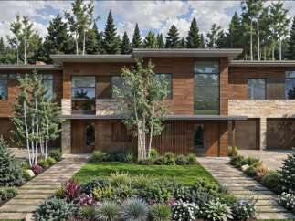 Experience modern luxury in this stunning home featuring a harmonious blend of natural wood and stone exteriors.