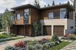Experience modern luxury in this stunning home featuring natural wood siding and a striking stone facade.