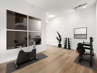 Elevate your fitness routine in this dedicated home gym, featuring a stationary bike and a versatile weight machine.