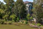 Experience luxury living with this stunning riverside property, offering breathtaking views and direct water access.