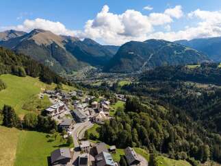 Discover this charming alpine village nestled amidst breathtaking mountain scenery.