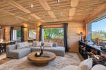 Experience luxurious mountain living in this stunning chalet-style living room.