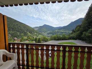Enjoy breathtaking mountain views from this charming balcony, perfect for your morning coffee or evening relaxation.