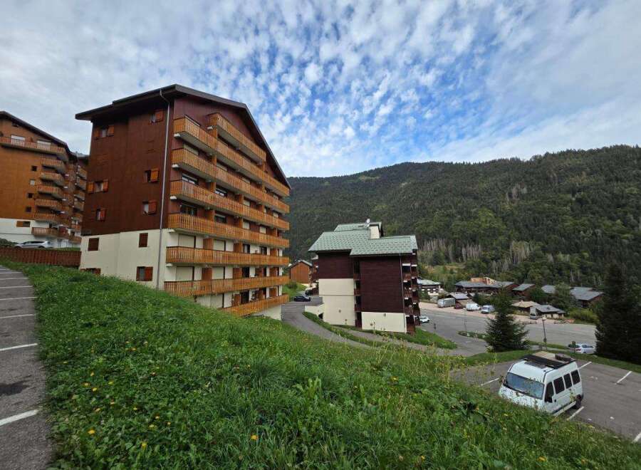 Discover this charming mountain property nestled amidst lush greenery and scenic mountain views.