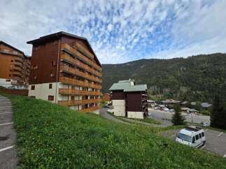 Discover this charming mountain property nestled amidst lush greenery and scenic mountain views.