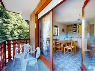 Enjoy the serene mountain views from this charming balcony, perfect for your morning coffee or evening relaxation.