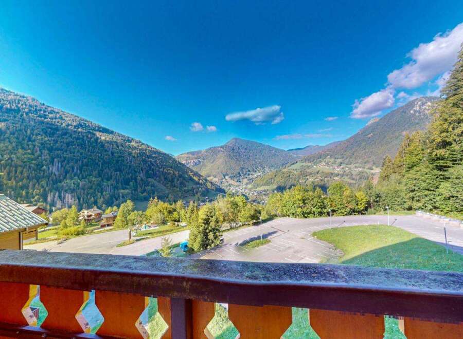 Experience breathtaking mountain views from this property, offering a serene escape amidst lush greenery and majestic peaks.