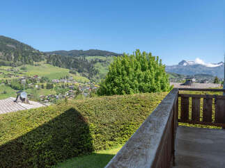 Enjoy breathtaking mountain views from this charming property, nestled amidst rolling green hills and a picturesque village.