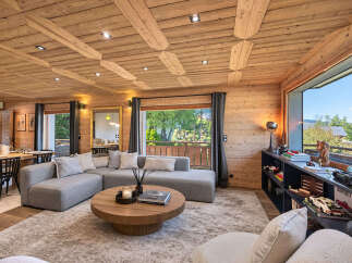 Experience luxurious mountain living in this stunning chalet-style living room.