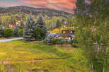 Nestled amidst a vibrant mountain landscape, this stunning property offers breathtaking views and a serene atmosphere.