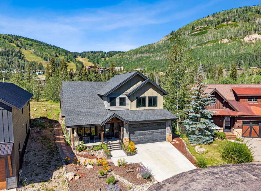 Nestled against a stunning mountain backdrop, this exquisite home offers the perfect blend of luxury and natural beauty.