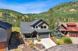 Nestled against a stunning mountain backdrop, this exquisite home offers the perfect blend of luxury and natural beauty.