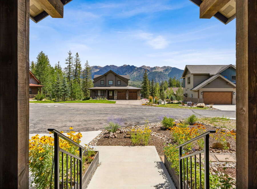 Experience mountain living in this stunning home, perfectly situated with breathtaking views of the majestic peaks.