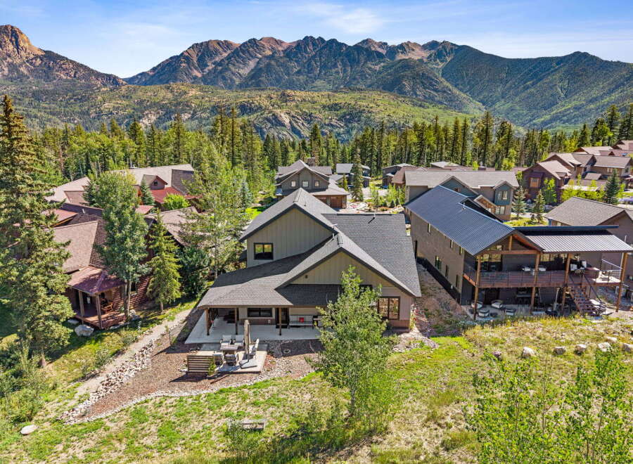 Nestled amidst a picturesque mountain landscape, this stunning property offers breathtaking views and luxurious living.