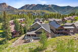 Nestled amidst a picturesque mountain landscape, this stunning property offers breathtaking views and luxurious living.