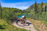 Discover a family-friendly paradise with this stunning playground overlooking a serene lake, perfect for outdoor recreation.