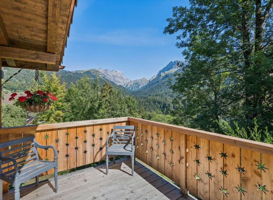 Enjoy breathtaking mountain views from this charming balcony, perfect for morning coffee or evening relaxation.