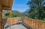 Enjoy breathtaking mountain views from this charming balcony, perfect for morning coffee or evening relaxation.