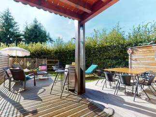 Enjoy outdoor living with this spacious deck, perfect for entertaining or relaxing.