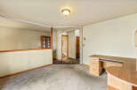 Discover a versatile space perfect for a home office or additional living area.