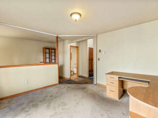 Discover a versatile space perfect for a home office or additional living area.