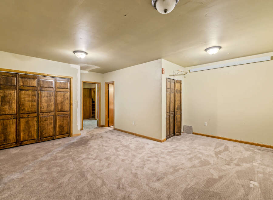 Discover ample storage with multiple spacious closets, including large wooden bi-fold doors perfect for organizing your belongings.