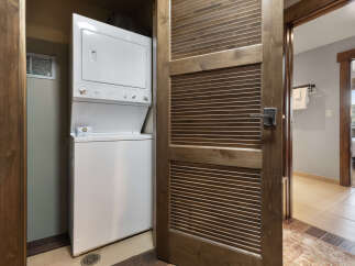Discover convenience with this stacked washer and dryer unit, perfect for maximizing space in your home.