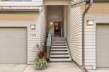 Welcome to this charming property featuring a well-maintained exterior with beige siding and a brown metal roof.