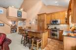 Experience the perfect blend of rustic charm and modern convenience in this stunning kitchen and dining area.