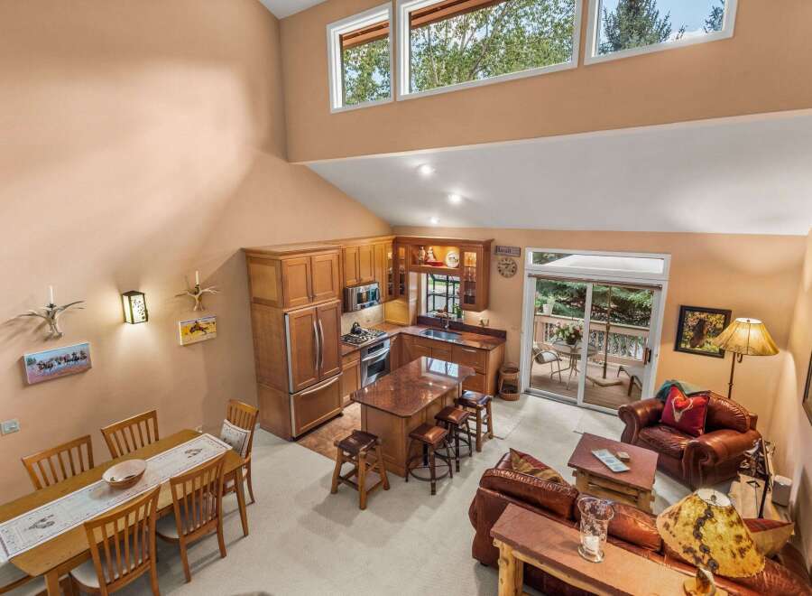 Experience the perfect blend of rustic charm and modern convenience in this stunning open-concept living space.