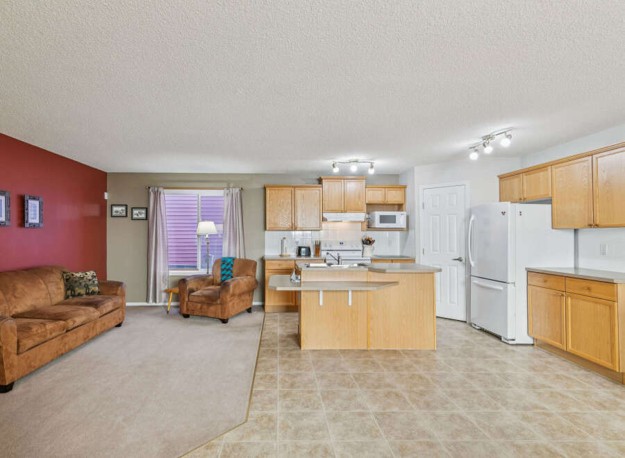 Discover this charming open-concept living space, perfect for modern living.