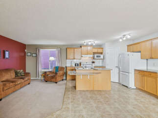 Discover this charming open-concept living space, perfect for modern living.