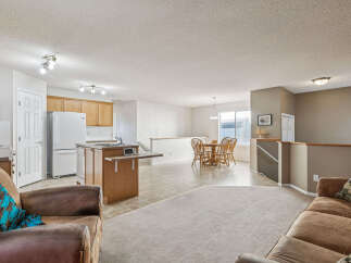 Discover this spacious open-concept living area, perfect for entertaining.
