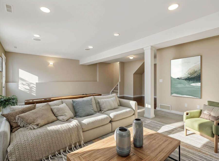 Discover comfortable living in this spacious basement family room, perfect for relaxation and entertainment.