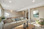 Discover comfortable living in this spacious basement family room, perfect for relaxation and entertainment.