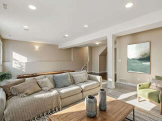 Discover comfortable living in this spacious basement family room, perfect for relaxation and entertainment.