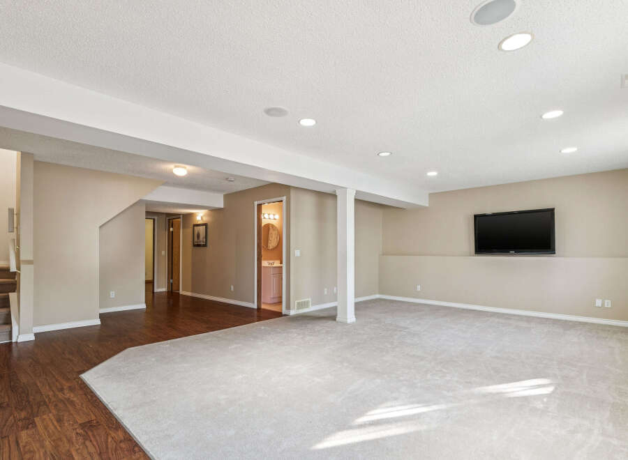 Discover this spacious finished basement, perfect for entertainment and relaxation.