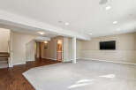 Discover this spacious finished basement, perfect for entertainment and relaxation.